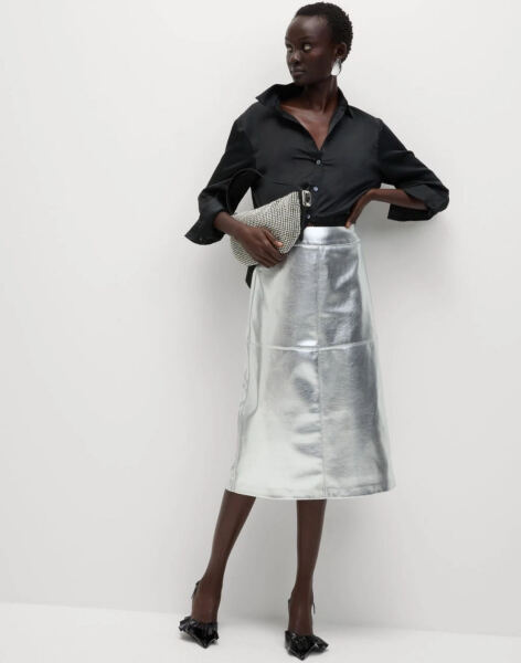 I’ve bought a silver pleather skirt!