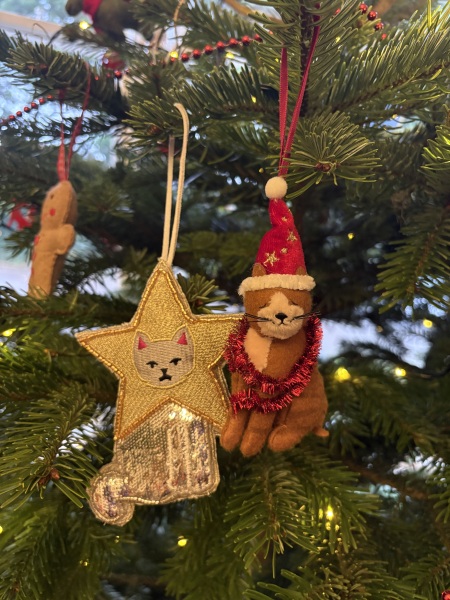Is there a way to deter my cat from climbing and lying in my Christmas tree?!