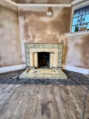 What colour would you paint this dated fireplace?