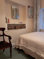 Tell me how to redecorate a small guest room