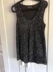 Can anyone find me a v neck sparkly top that has a good fit to wear with jeans for a night out?