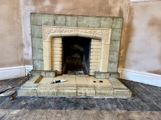What colour would you paint this dated fireplace?