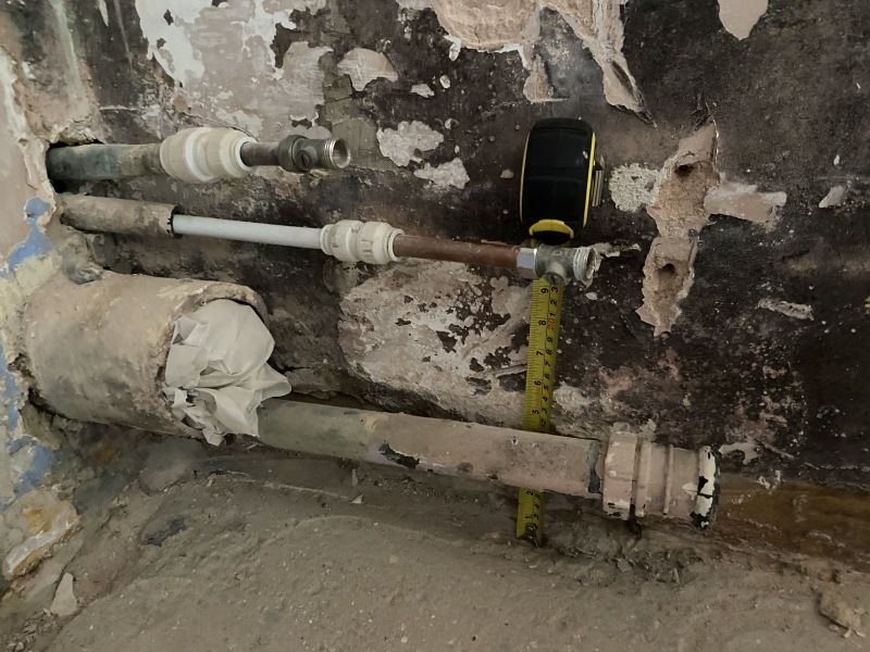 Help! Shower waste level trouble - how to adjust this copper to cast iron junction? (Pics)
