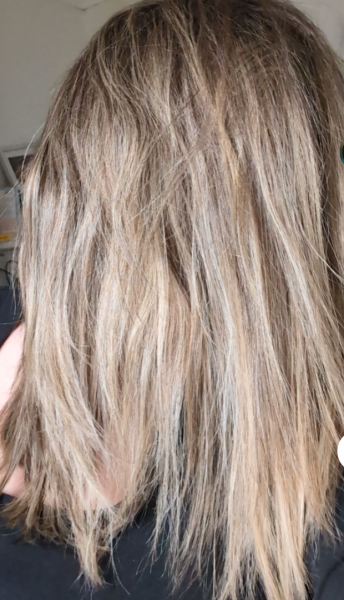 Can hair be toned down after bleaching?