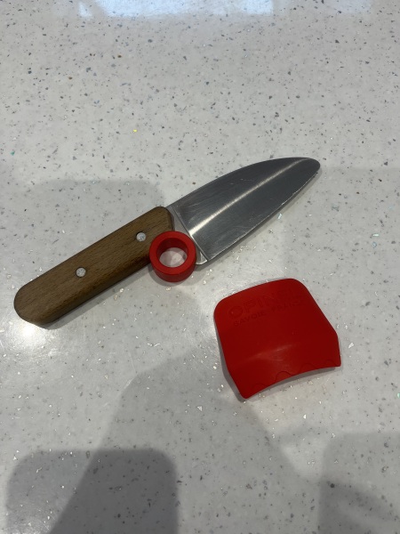 Is 8 too young to use a sharp knife for cooking?