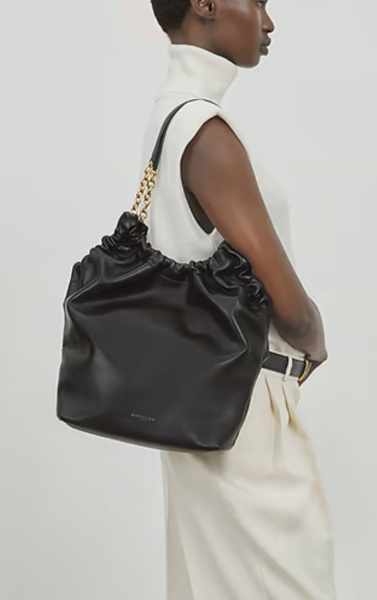 Help me choose a navy tote bag for Christmas. Budget around £600