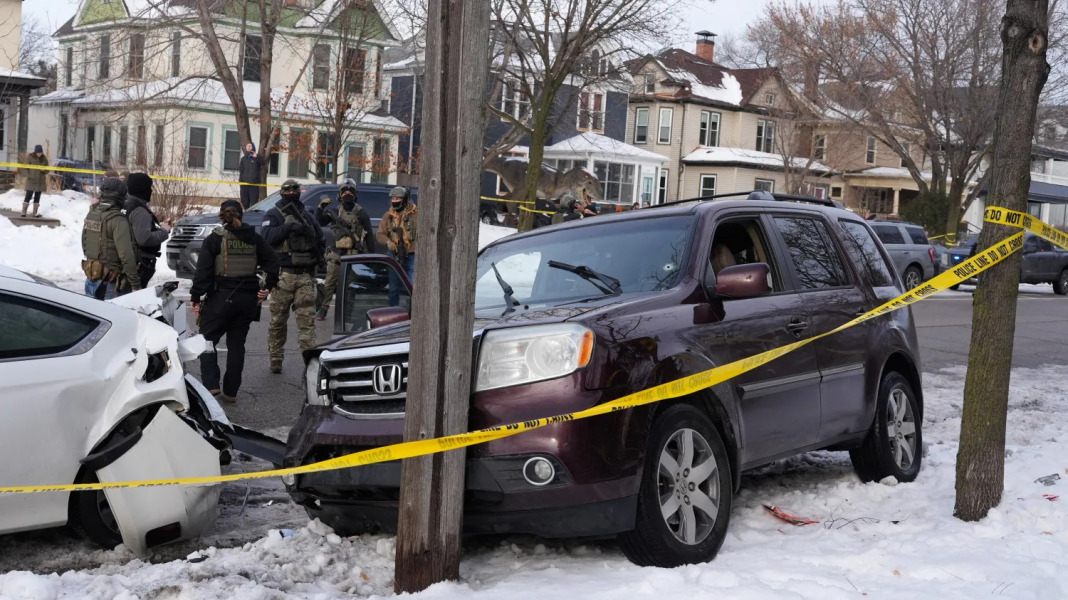 ICE agent shoots woman in the face.