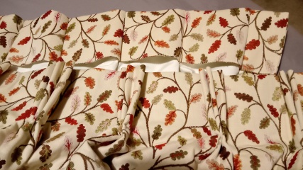 How do you hang up curtains that don't have rings built-in to allow them to be attached to a pole?