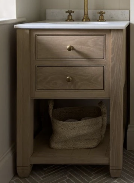 This is a long shot!  Anyone know where I can find this bathroom vanity?