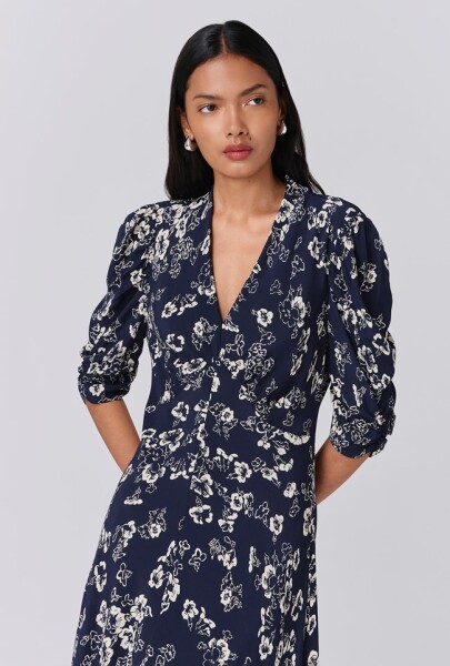 Are these two dresses dated for workwear?