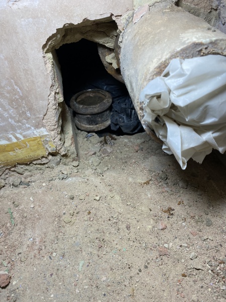 Help! Shower waste level trouble - how to adjust this copper to cast iron junction? (Pics)