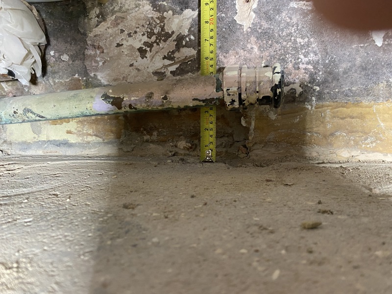 Help! Shower waste level trouble - how to adjust this copper to cast iron junction? (Pics)