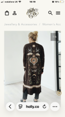 Astrological symbols long jacket seen in Liverpool
