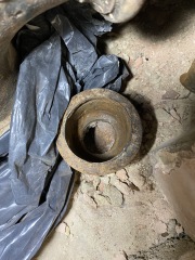 Help! Shower waste level trouble - how to adjust this copper to cast iron junction? (Pics)