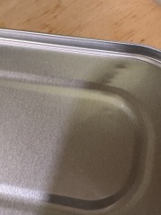 Would this tin dent bother you?