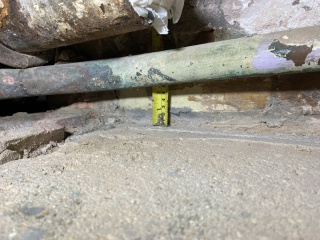 Help! Shower waste level trouble - how to adjust this copper to cast iron junction? (Pics)