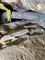 Help! Shower waste level trouble - how to adjust this copper to cast iron junction? (Pics)