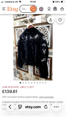 Astrological symbols long jacket seen in Liverpool