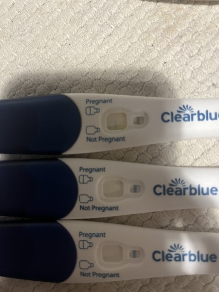 1 faint positive, 2 negative tests