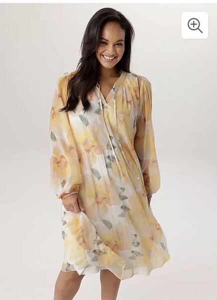 Help me find a jacket/cardigan to go with this dress please