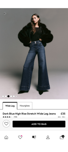 Jeans, quite fitted at the top but loose and baggy at the bottom