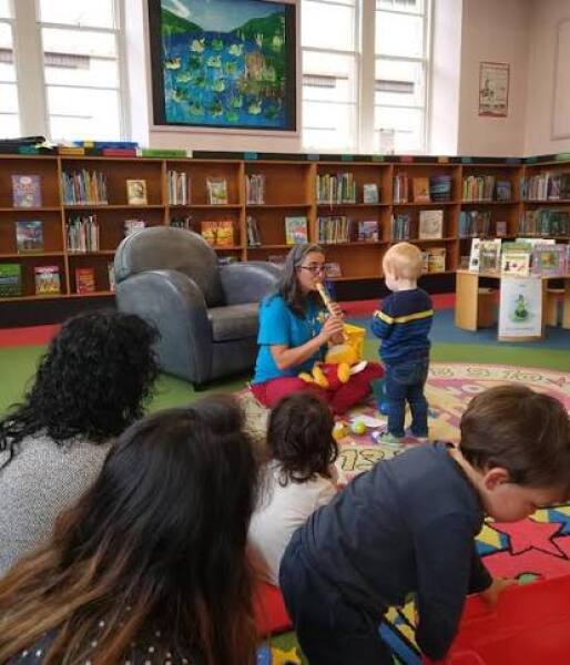 AIBU to question praying and sleeping in the library kids area?