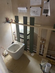 Help! Shower waste level trouble - how to adjust this copper to cast iron junction? (Pics)