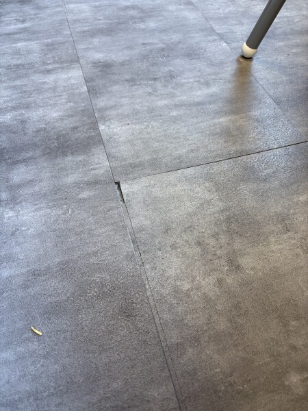 LVT floor cracking and lifting after 18 months, what next?