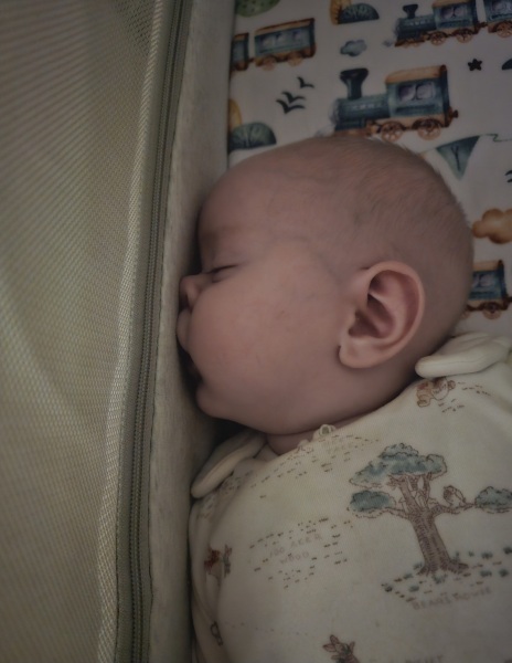 Moving 8 week old to own room or keep beside me?