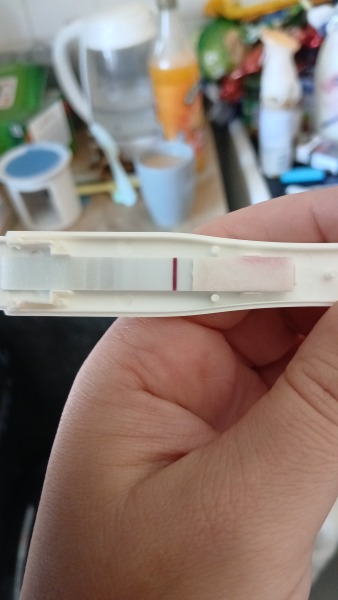 Can anyone see a faint line at 9 DPO on this test?