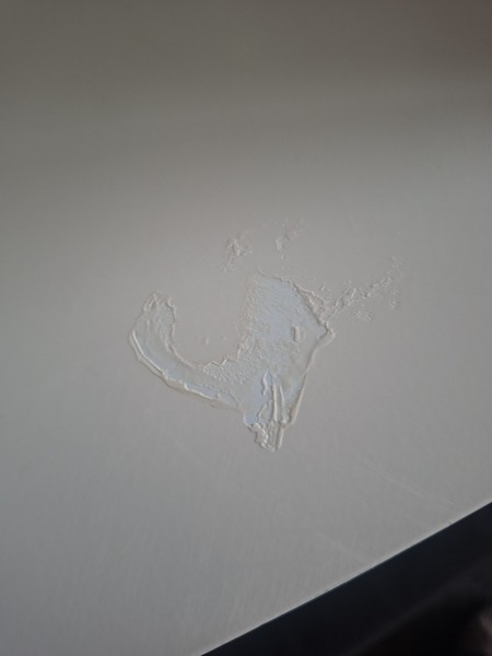 How to repair this melted paint patch