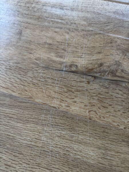Dining chairs have scratched Karndean!