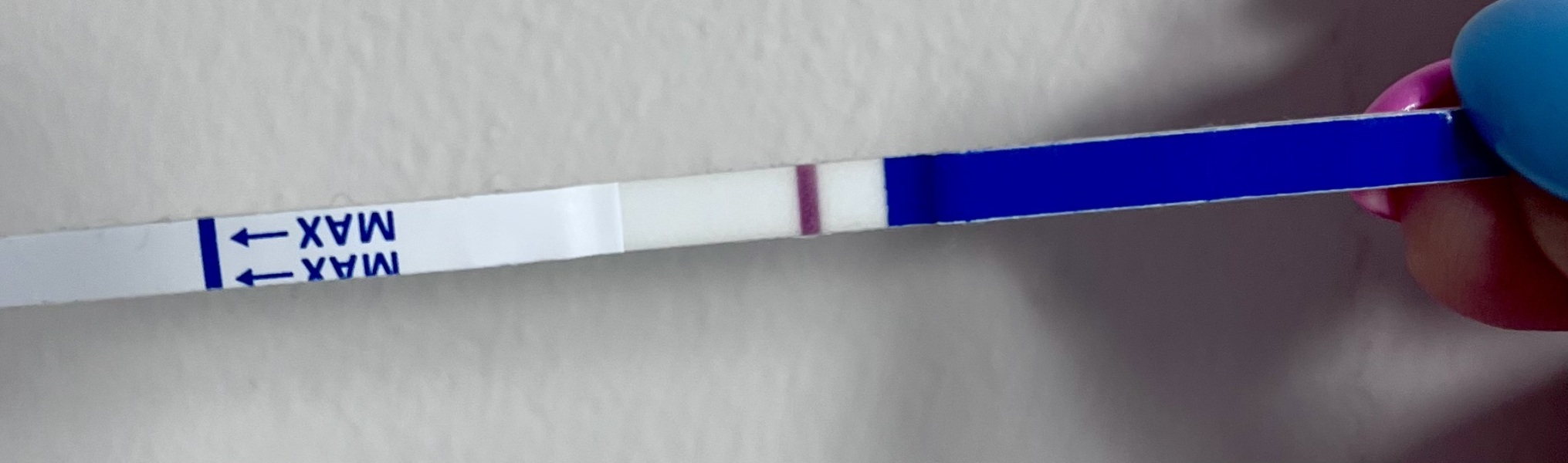 Can anyone see a faint line at 9 DPO on this test?