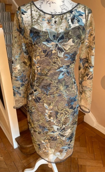 What to wear over this (it's a wedding one)?