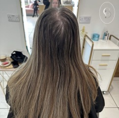 Can grey roots be covered without going darker than natural colour?