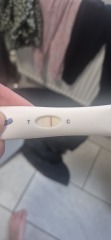 11dpo test result: does this look positive or an indent?
