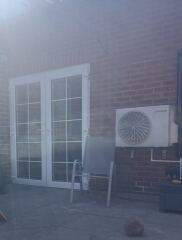 Ideas for hiding this air con unit please