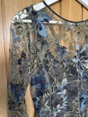 What to wear over this (it's a wedding one)?