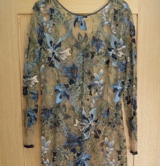 What to wear over this (it's a wedding one)?