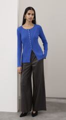 Are cardigans really a fashion mistake, or still practical for summer layering?