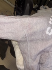Does this look like a lipstick stain on his t shirt?