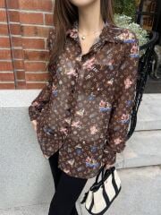 Which outfit looks better, Outfit 1 or Outfit 2?