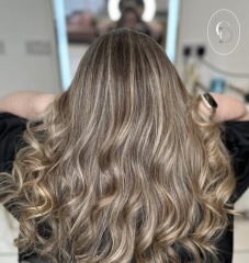 Can grey roots be covered without going darker than natural colour?