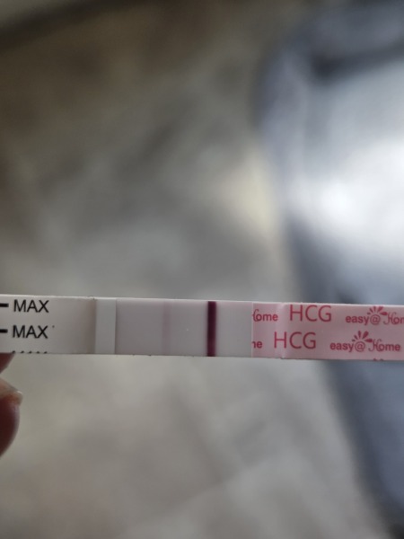 FAINT POSITIVE AT 7/8DPO