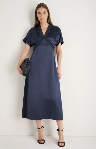 What stylish dress to impress options suit a curvy mid-forties figure?