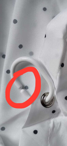 How do you put a shower curtain on the rod?