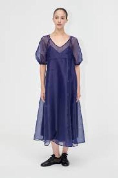 What stylish dress to impress options suit a curvy mid-forties figure?