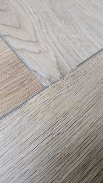 Damaged strips between LVT tiles