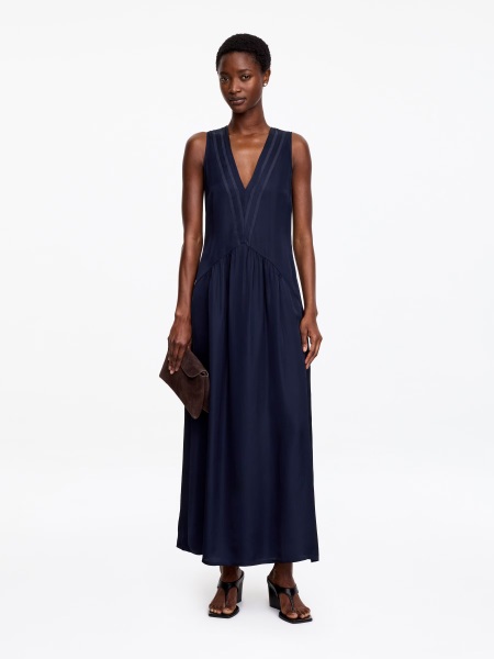 What stylish dress to impress options suit a curvy mid-forties figure?