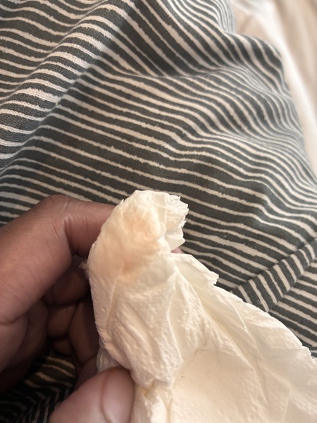 Could this light spotting be implantation bleeding or an early period